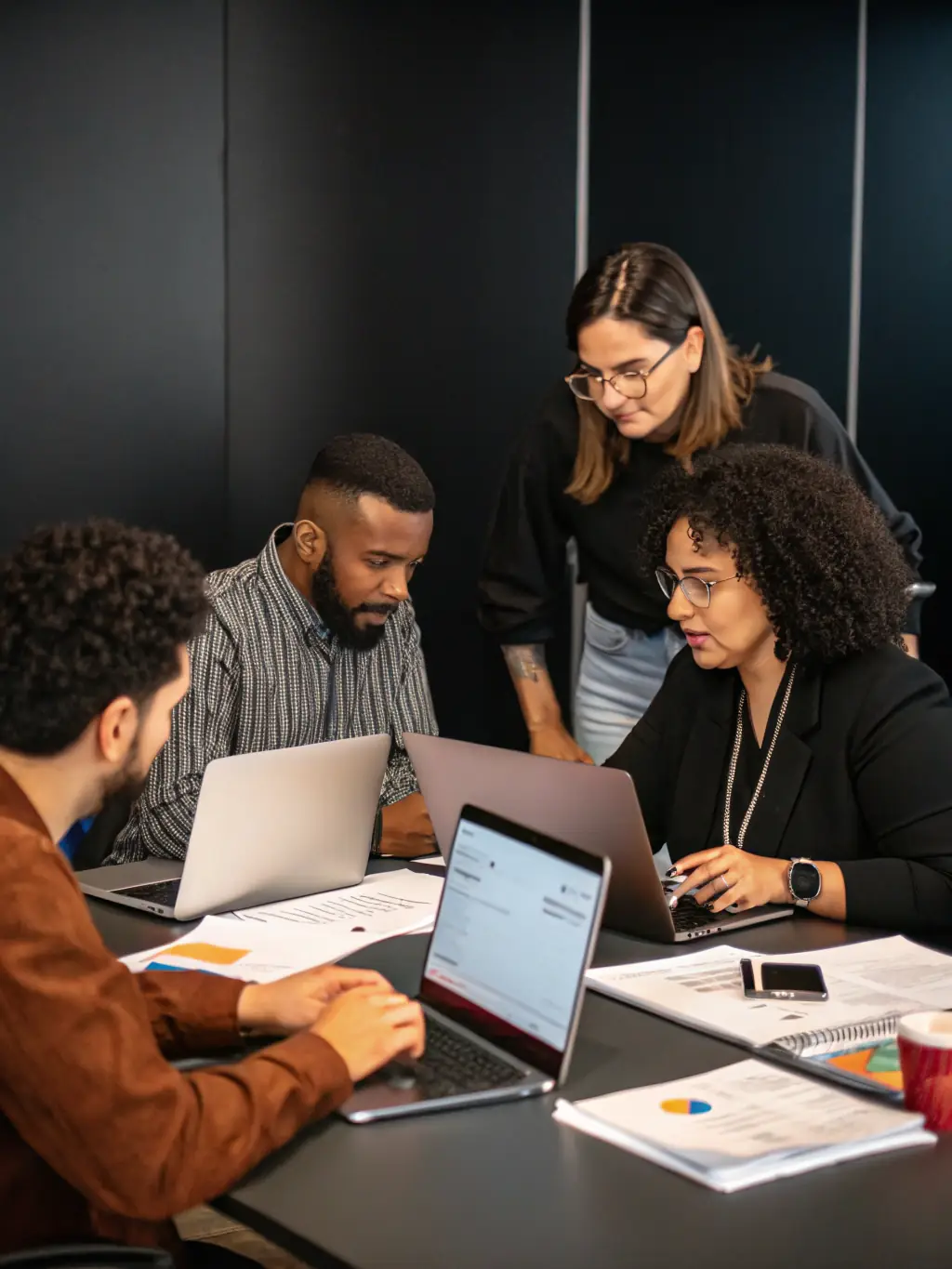 A diverse group of professionals collaborating using Talent Bridge, highlighting its effectiveness in connecting talent with opportunities.